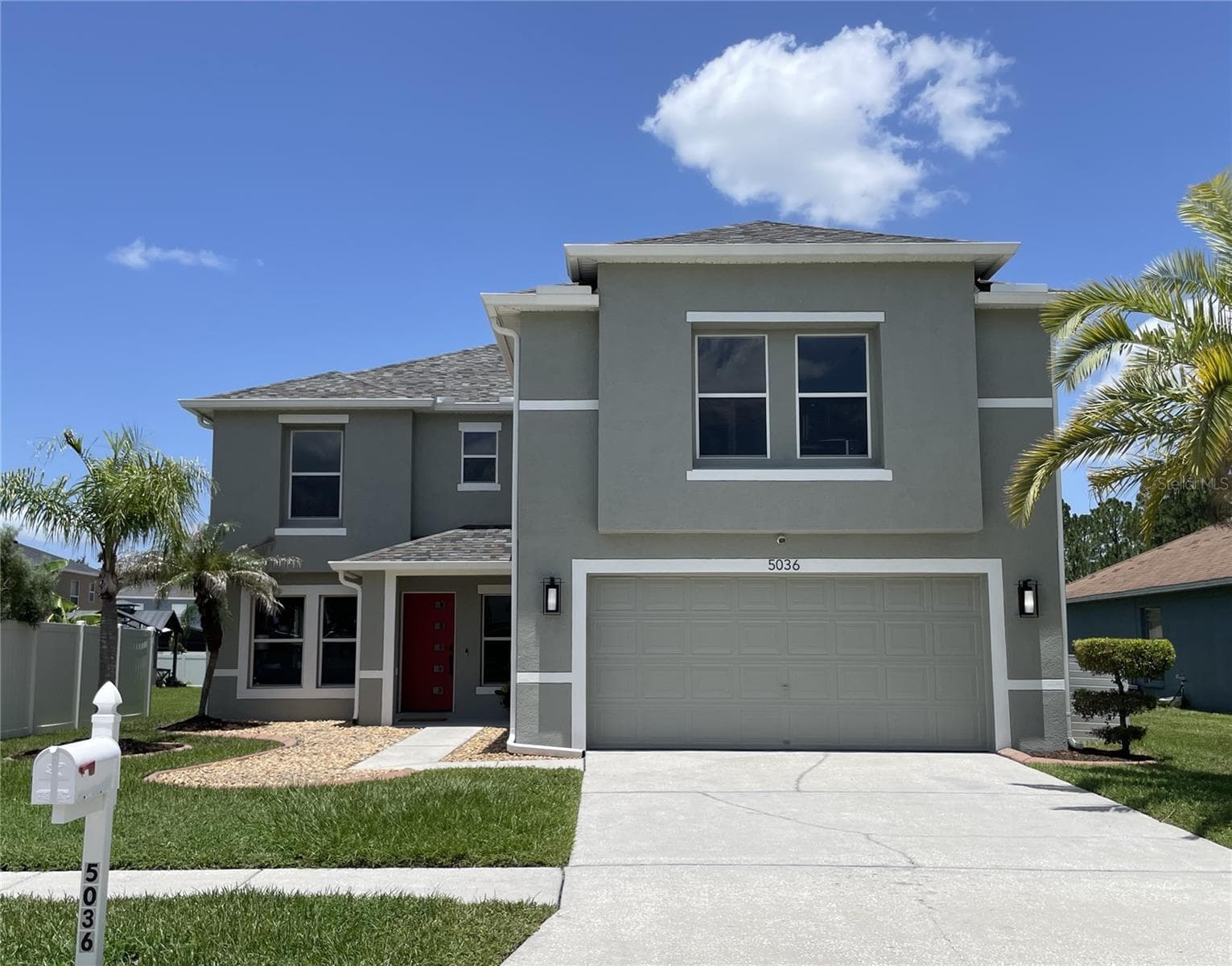 5036 WHISTLING PINES COURT